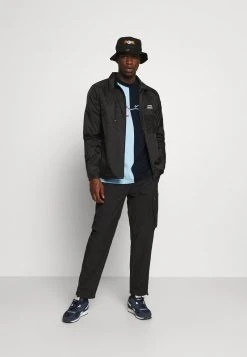 Karl Kani SIGNATURE BLOCK TEE UNISEX - T-Shirt Print - Navy -Outlet KARL KANI Store e2559199e5ed402089ba5c7bae263c6b