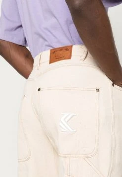 Karl Kani ECRU PANTS UNISEX - Jeans Relaxed Fit - Light Sand -Outlet KARL KANI Store e3c73ece7576467896b4846a85f168cf