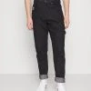 Karl Kani RETRO RINSED PANTS UNISEX - Jeans Relaxed Fit - Black 1 Karl Kani RETRO RINSED PANTS UNISEX - Jeans Relaxed Fit - Black -Outlet KARL KANI Store e61f610fc2ec46889d8e60f8c20eab5f