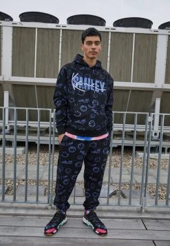 KARL KANI X SMILEY® SIGNATURE REGULAR FIT UNISEX - Jogginghose - Black