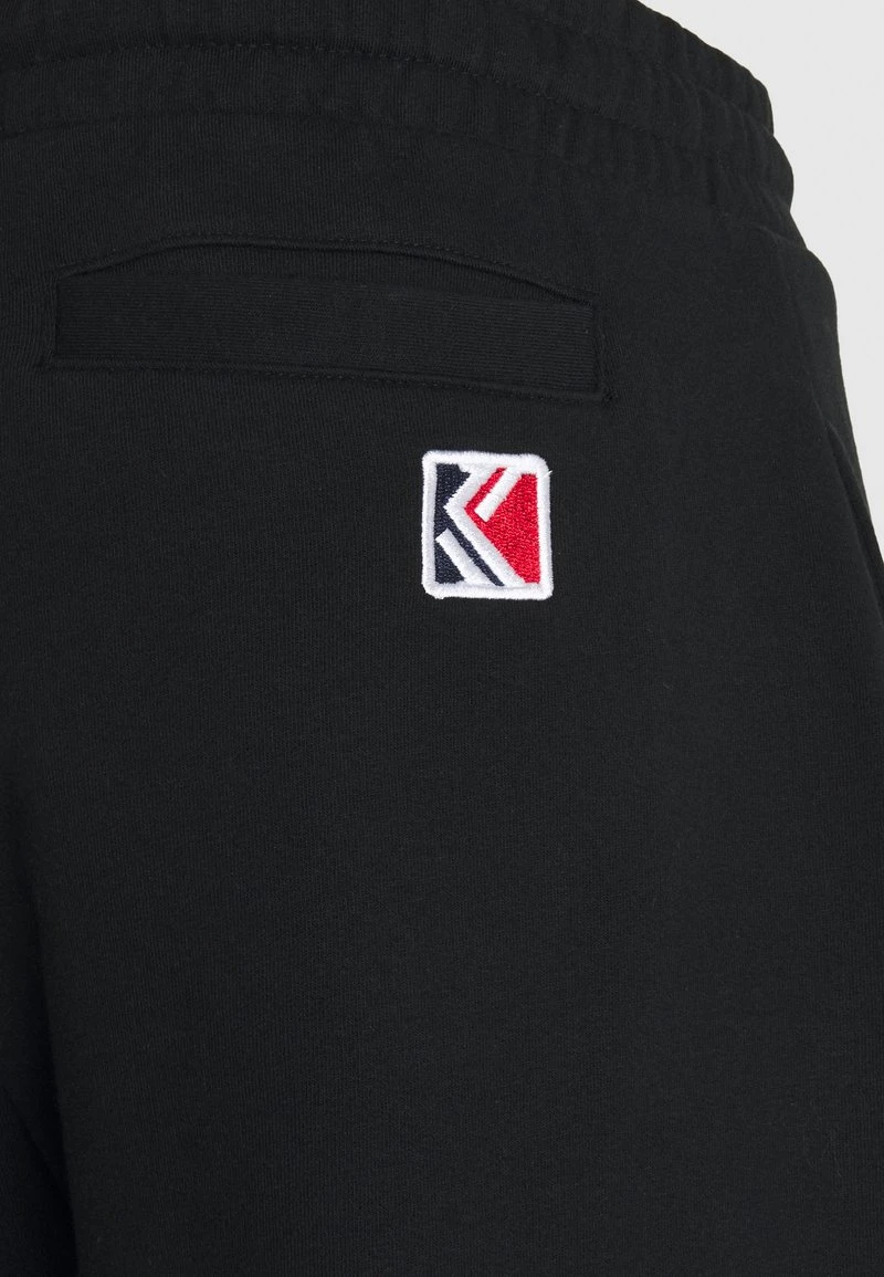 SMALL SIGNATURE UNISEX - Jogginghose - black Karl Kani SMALL SIGNATURE UNISEX - Jogginghose - Black -Outlet KARL KANI Store f979e69fbc9842b0aeb7ce40eab9d504