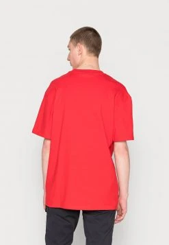 KARL KANI X SMILEY® SMALL SIGNATURE TEE UNISEX - T-Shirt Basic - Red -Outlet KARL KANI Store fce6418437924c11aa356f445dffecf1